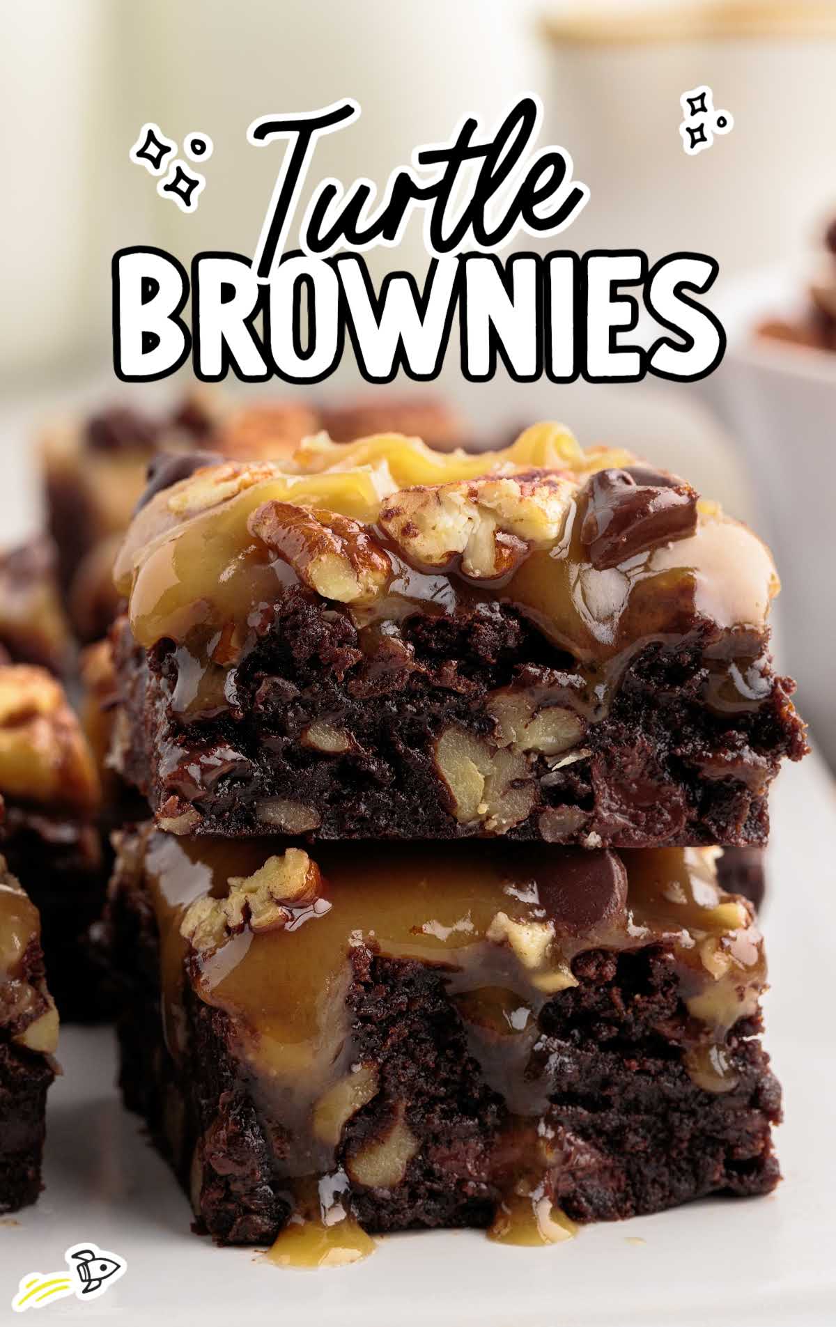 close up shot of Turtle Brownies stacked on top of each other