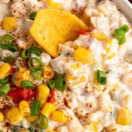 Loaded street corn dip with creamy base, corn, jalapeños, and paprika, labeled "Best Mexican Street Corn Dip – Stir Together in Minutes!"