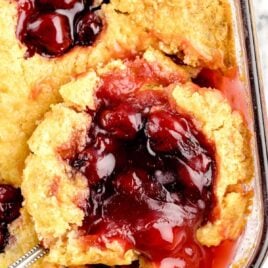 overhead shot of 7UP Cherry Cobbler with a spoon grabbing a piece