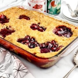 a close up shot of 7UP Cherry Cobbler in a pan