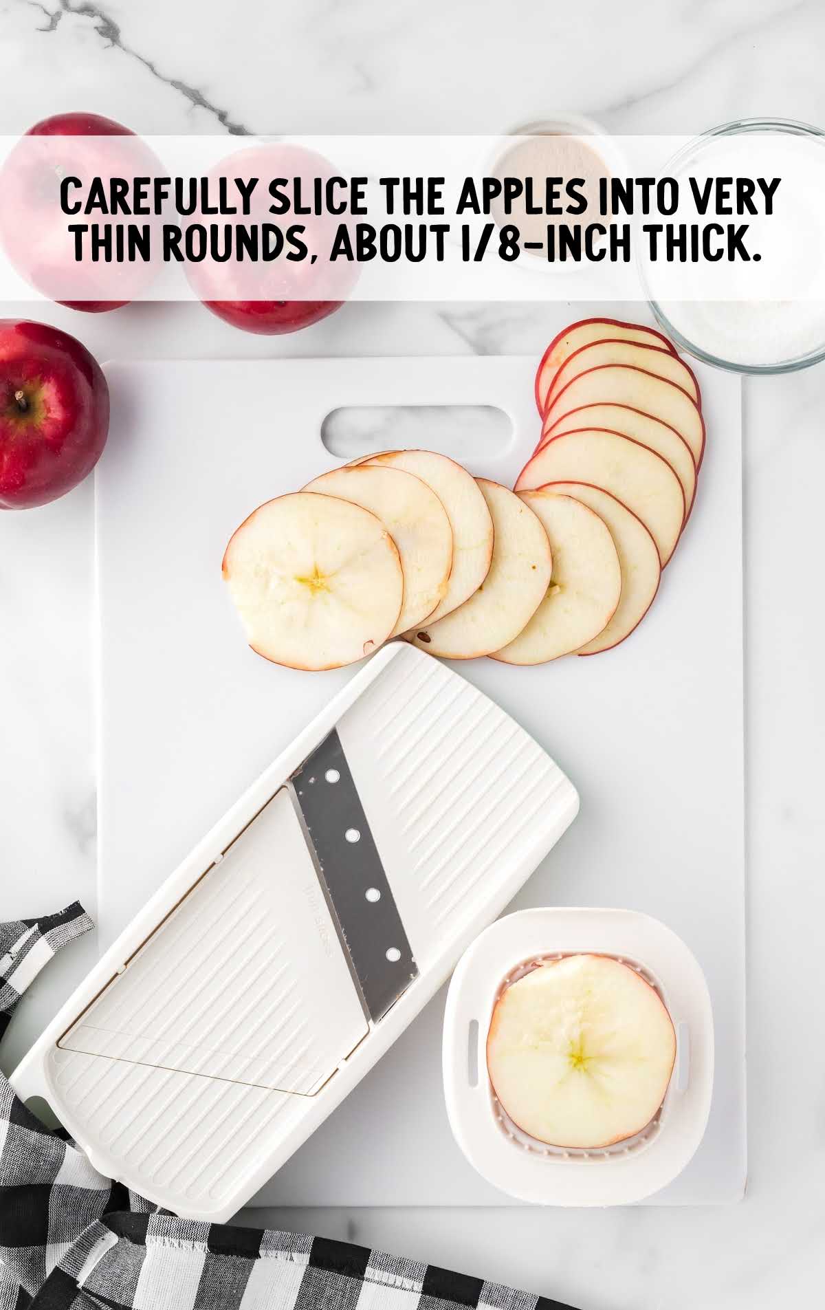 apples sliced on a cutting board