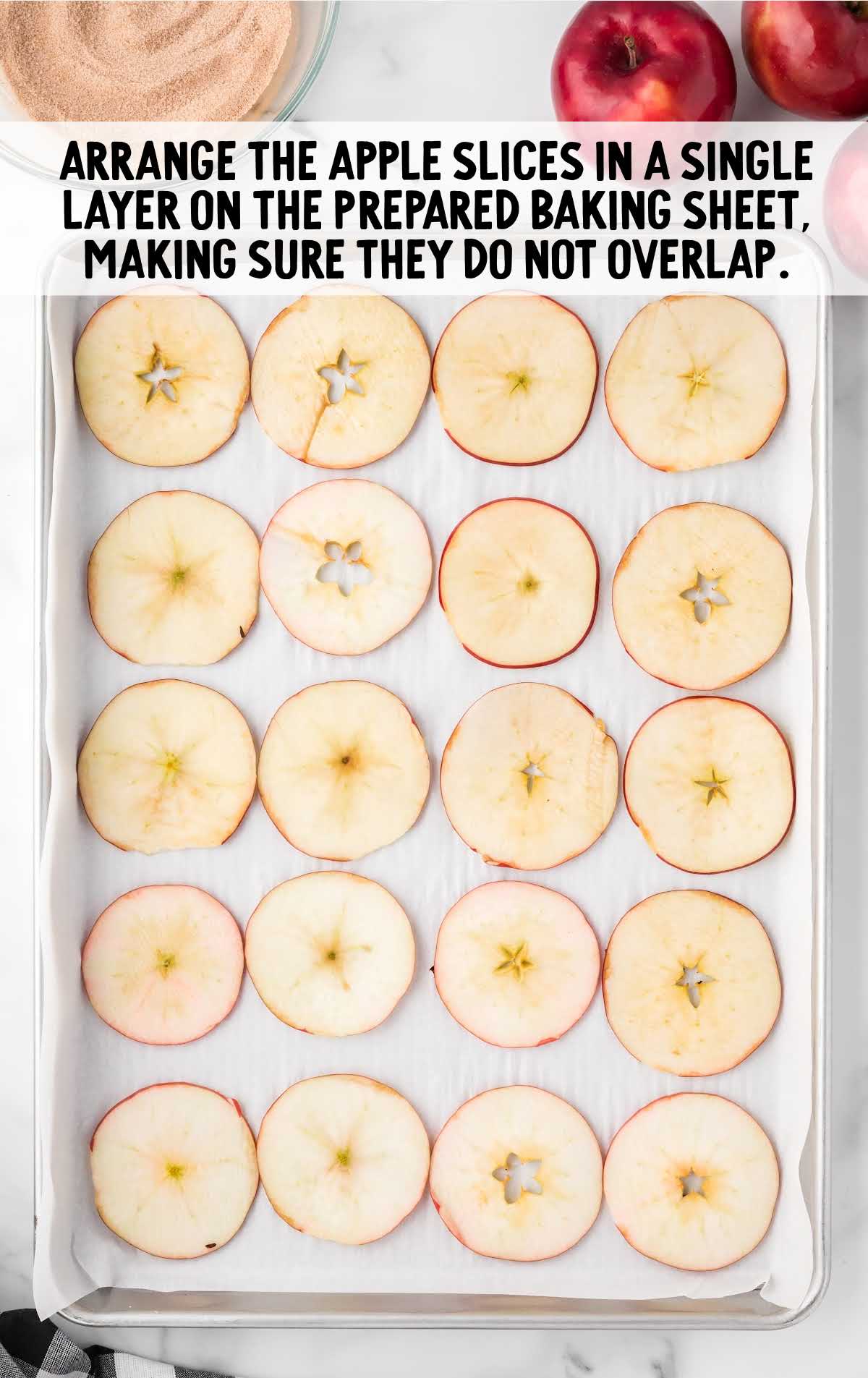 apple slices arranged on a baking sheet