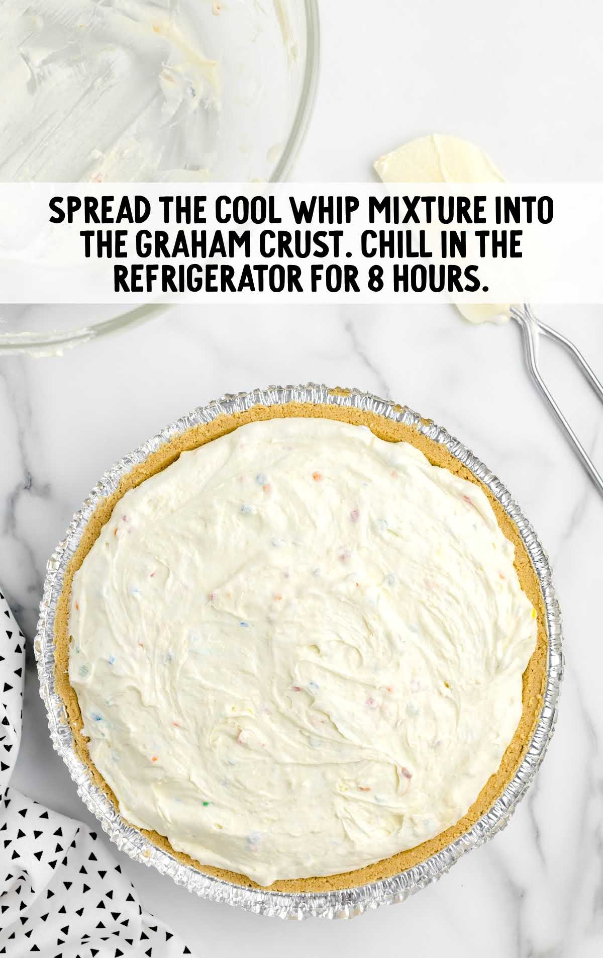 Cool Whip mixture spread into the pre-made graham cracker crust