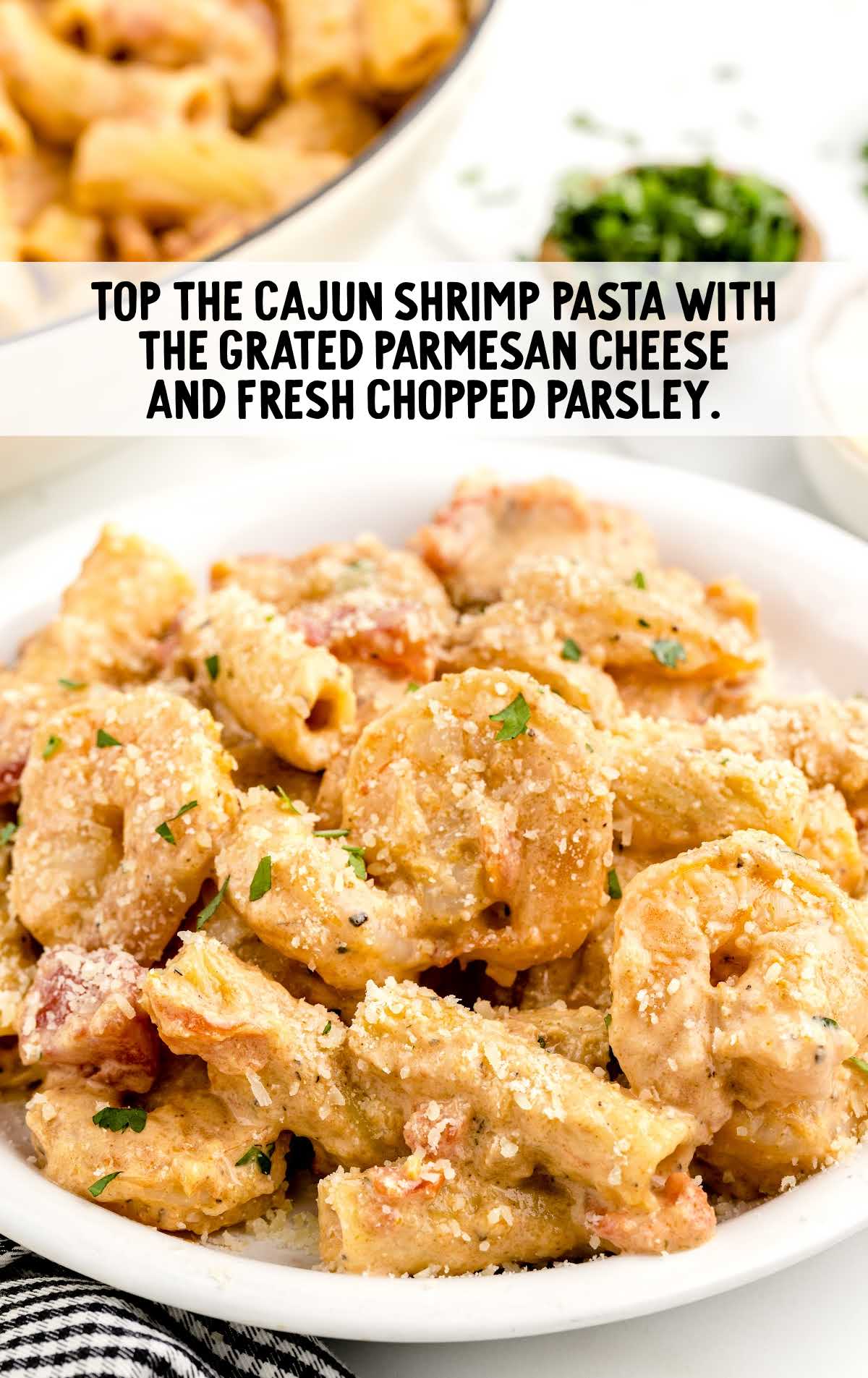 parmesan cheese topped on top of the shrimp pasta