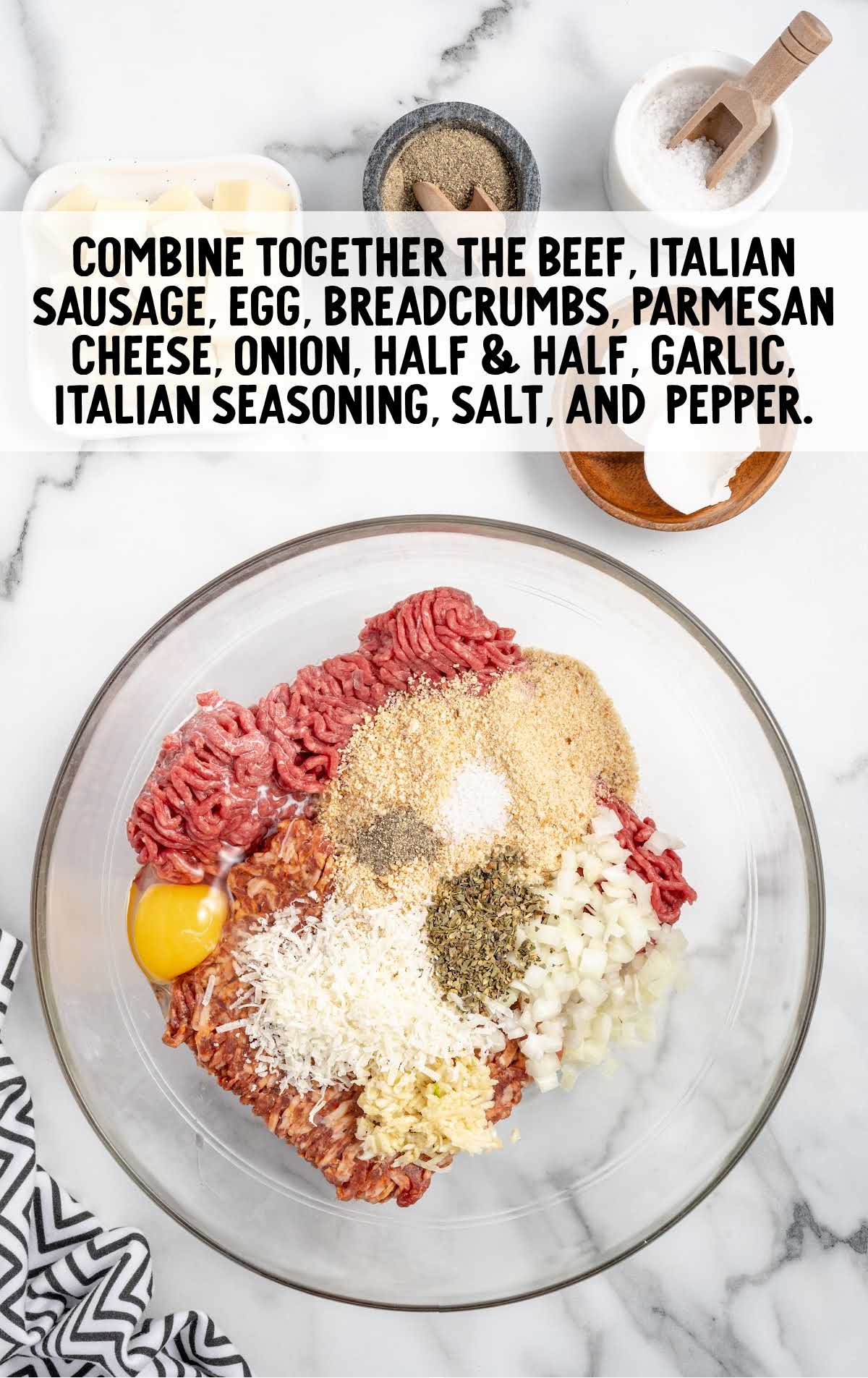 beef, italian sausage, egg, breadcrumbs, parmesan cheese, onion, half & half, garlic, italian seasoning, salt, and pepper combined