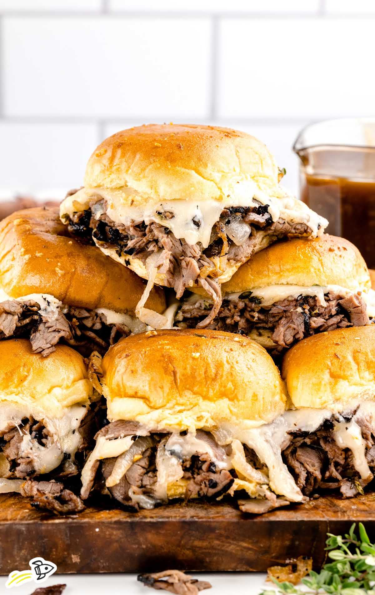 close up shot of French Dip Sliders stacked on top of each other