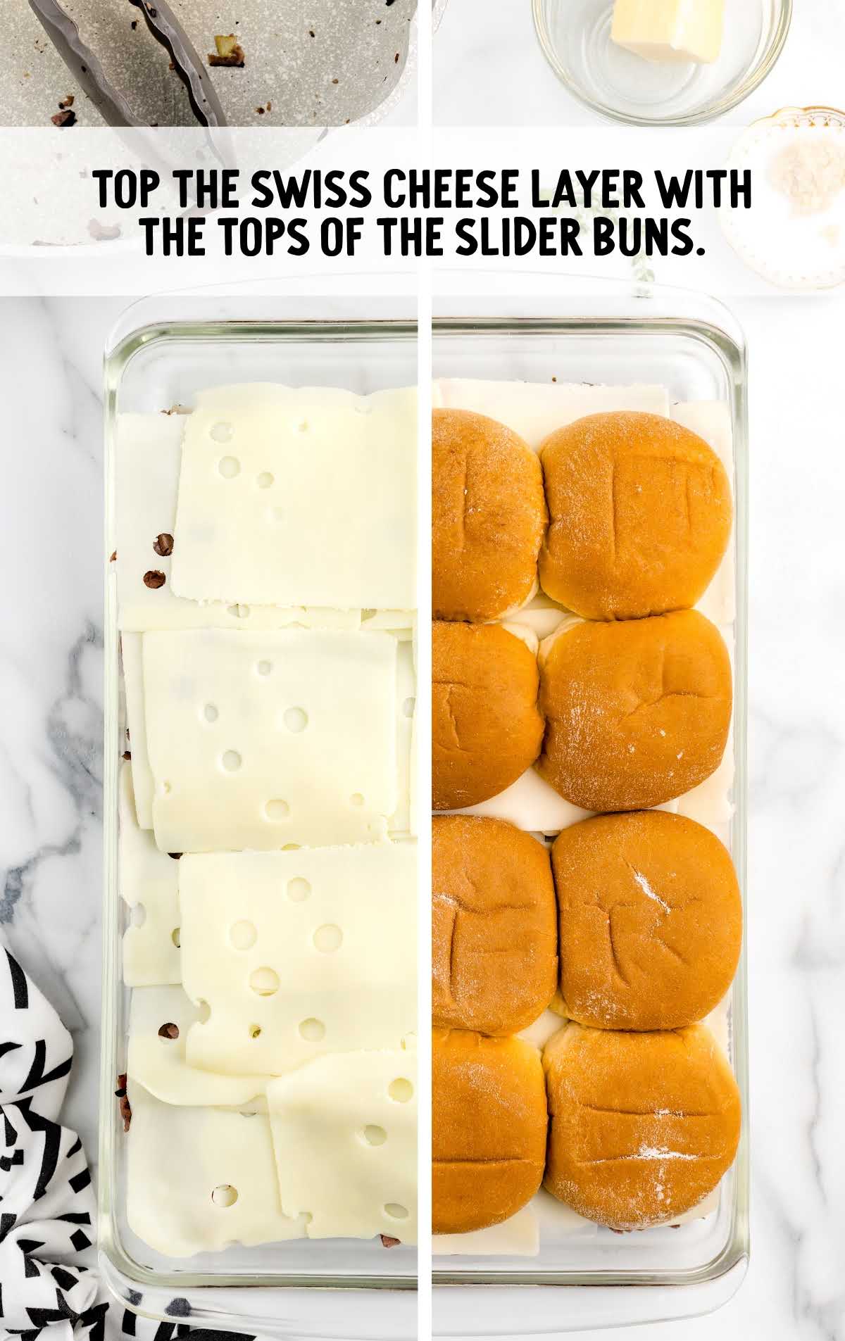 Swiss cheese layered with the tops of the slider buns