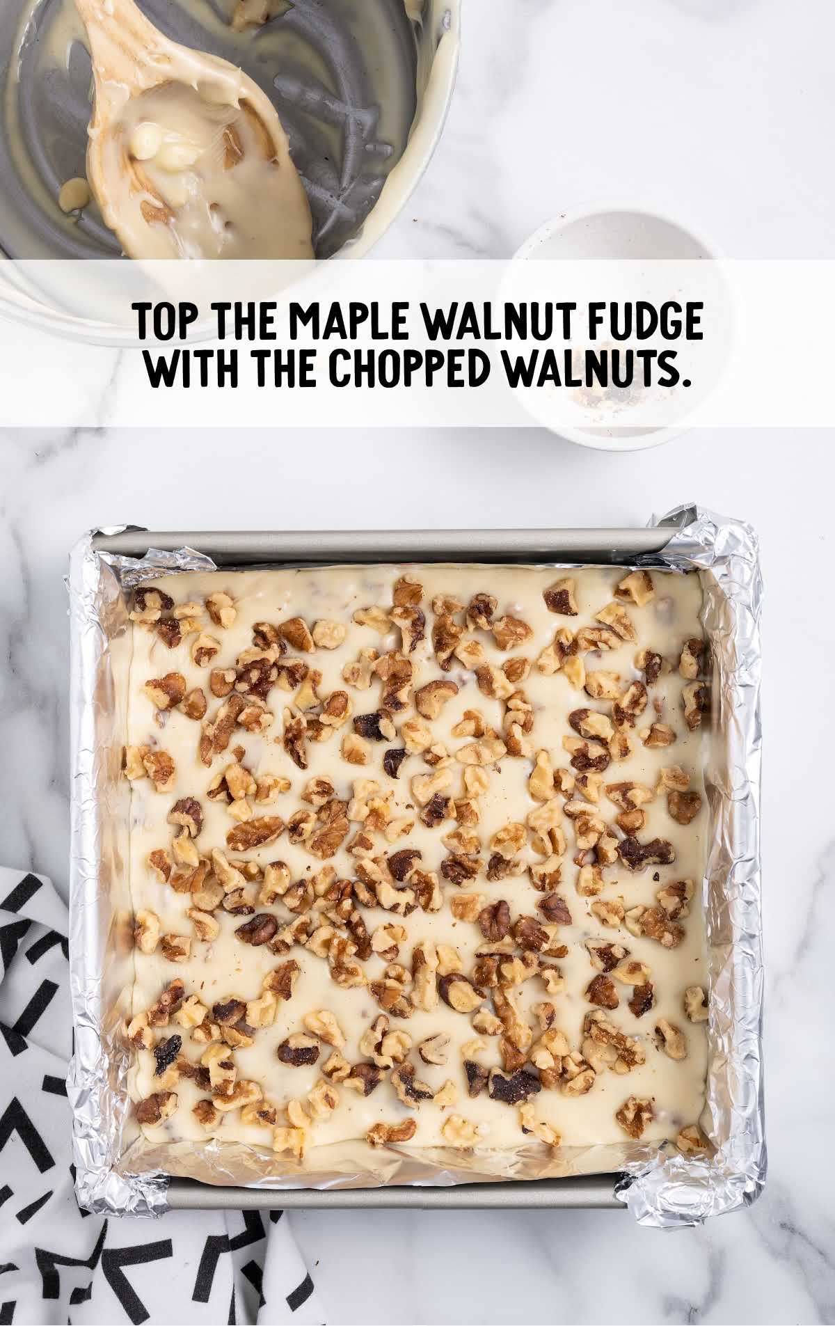 fudge topped with chopped walnut