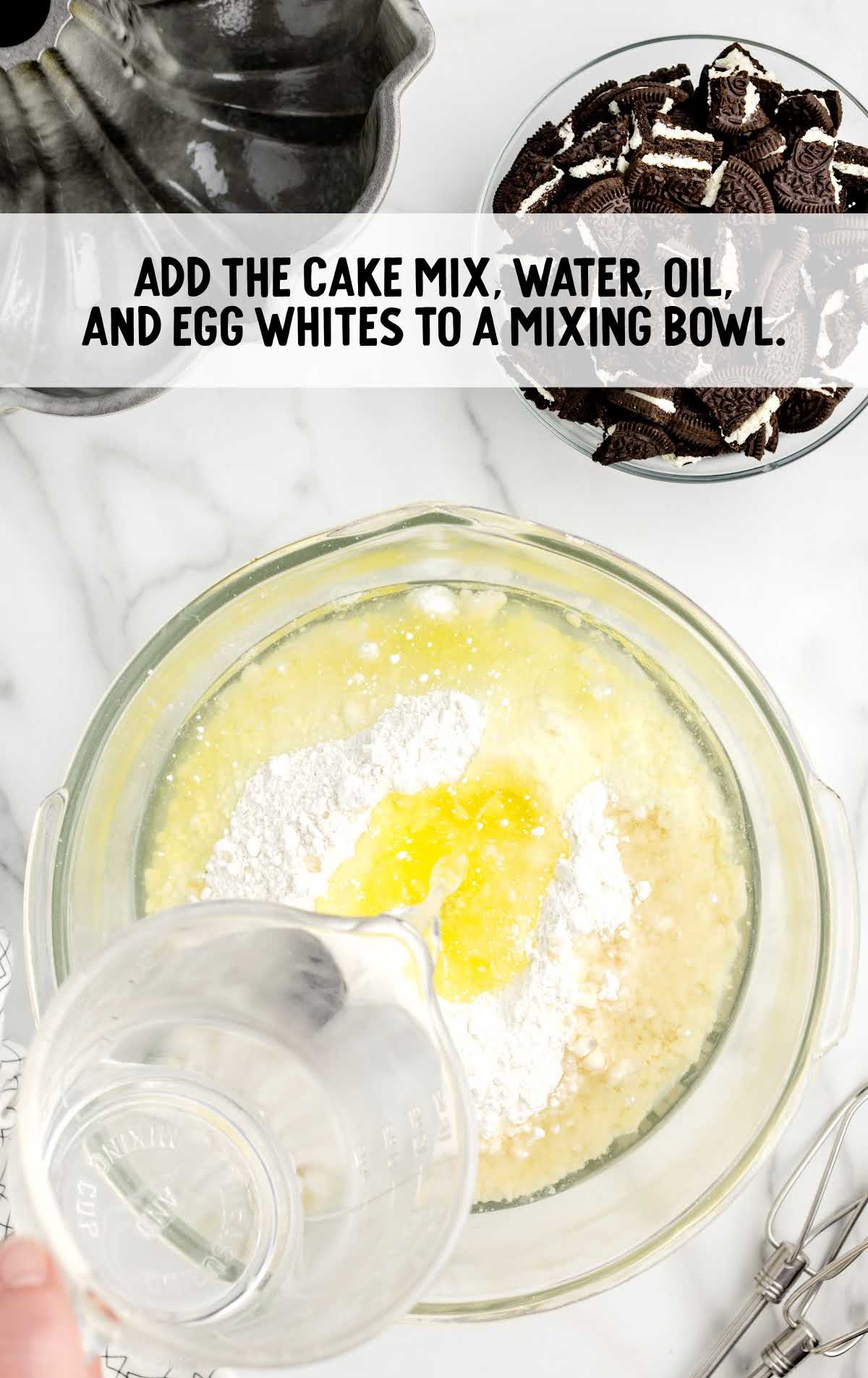 cake mix, water, oil, and egg combined in a bowl