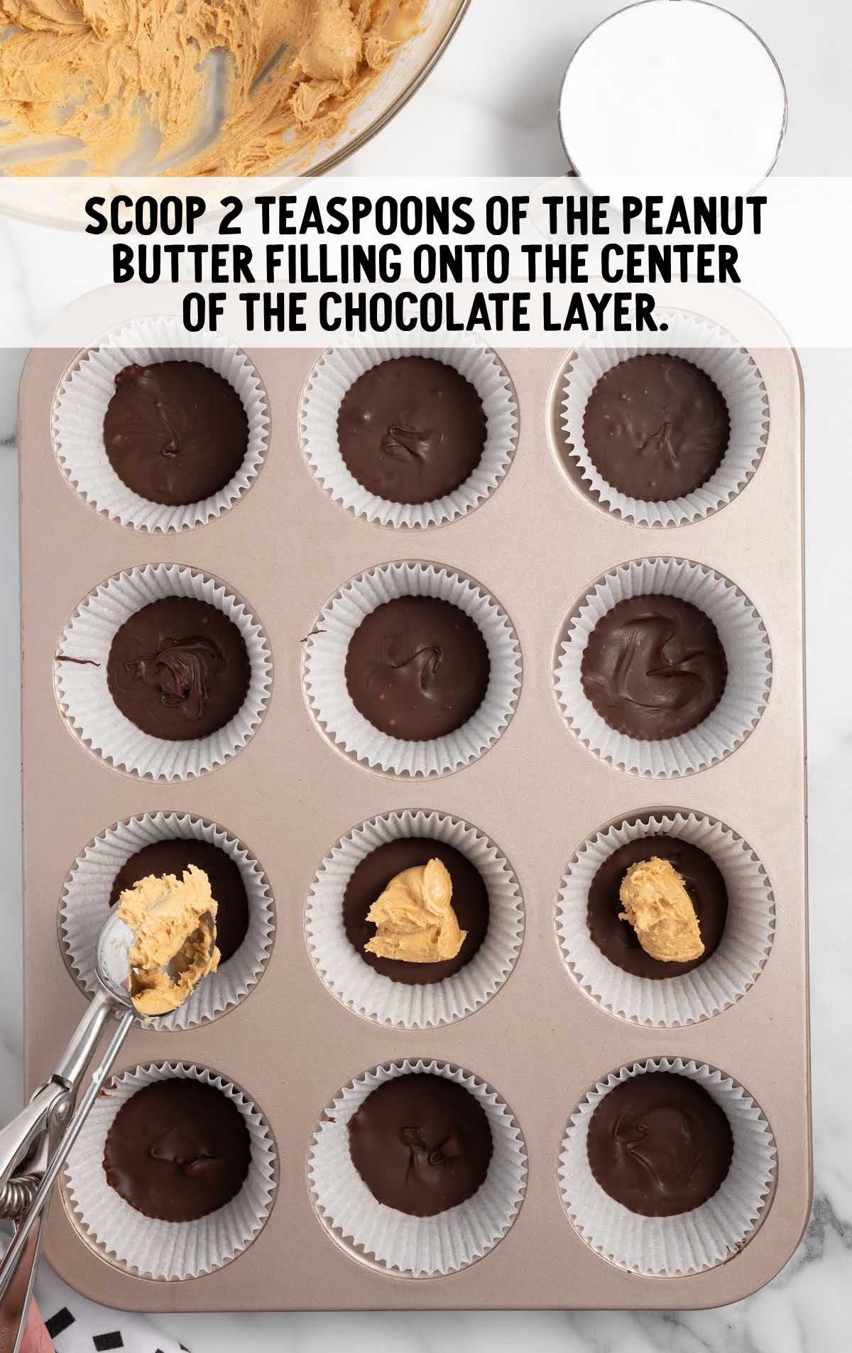 peanut butter filling scooped onto the center of the chocolate layer