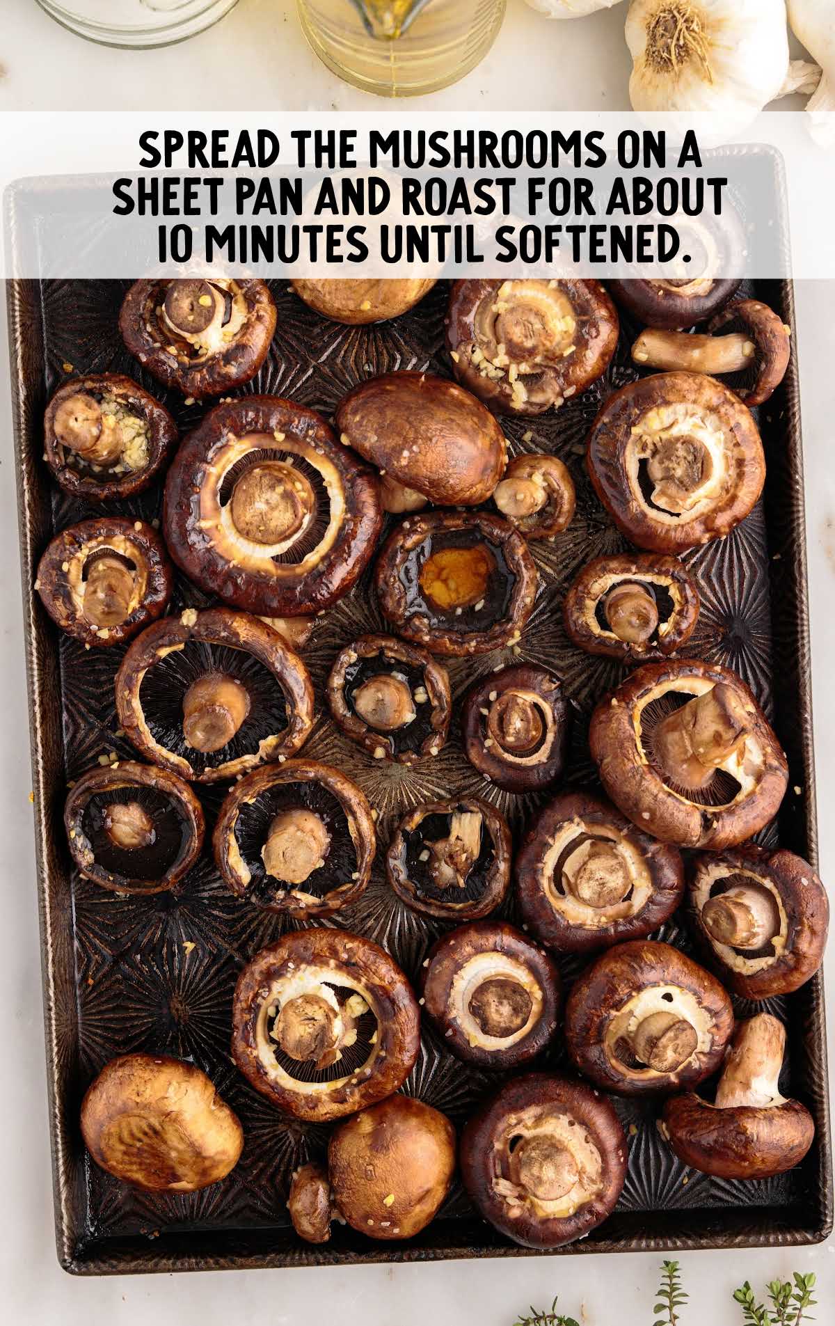 mushrooms spread on a sheet and roasted