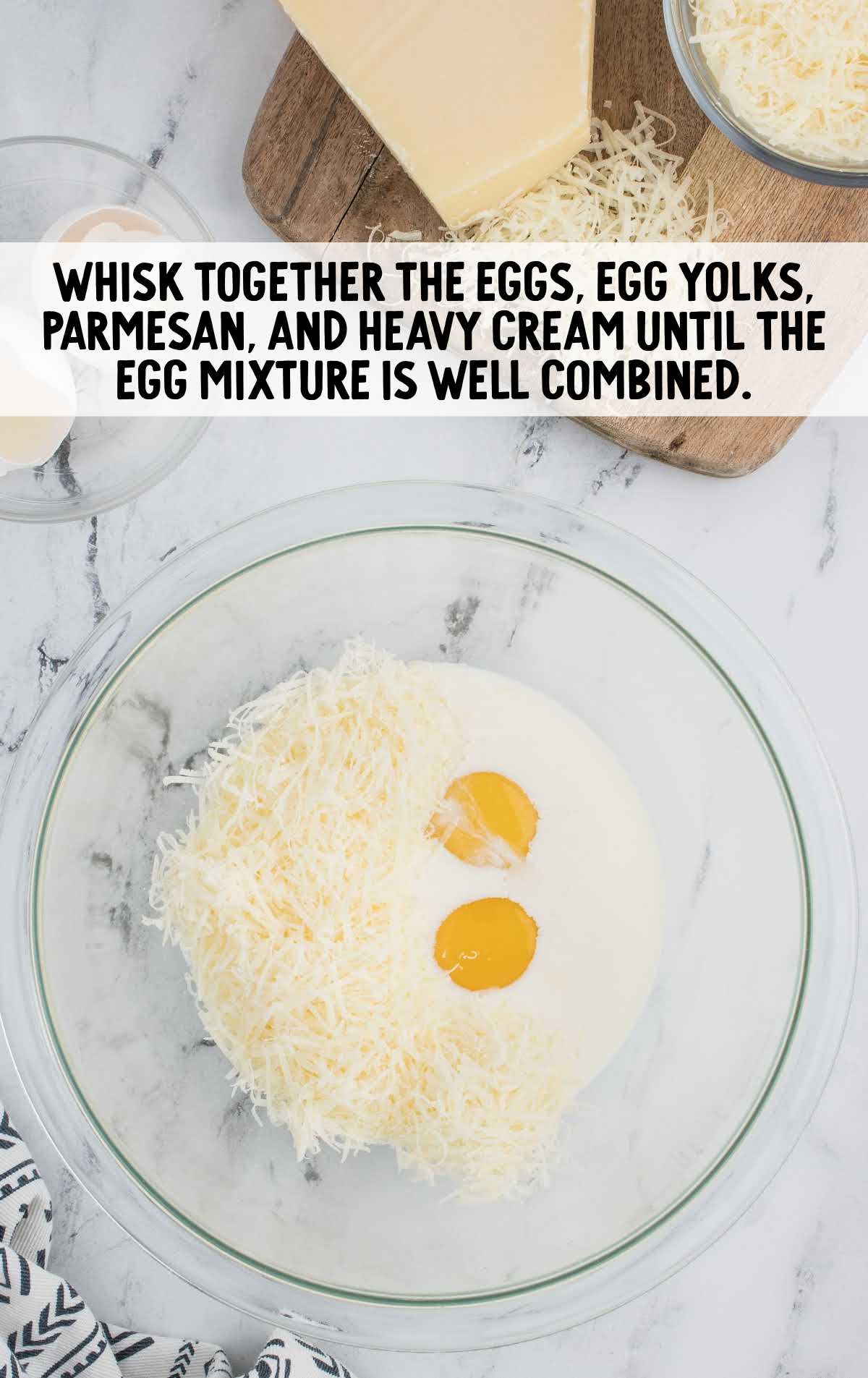 eggs, egg yolk, parmesan, and heavy cream whisked together