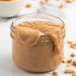 a close up shot of 3 Ingredient Satay Sauce in a jar