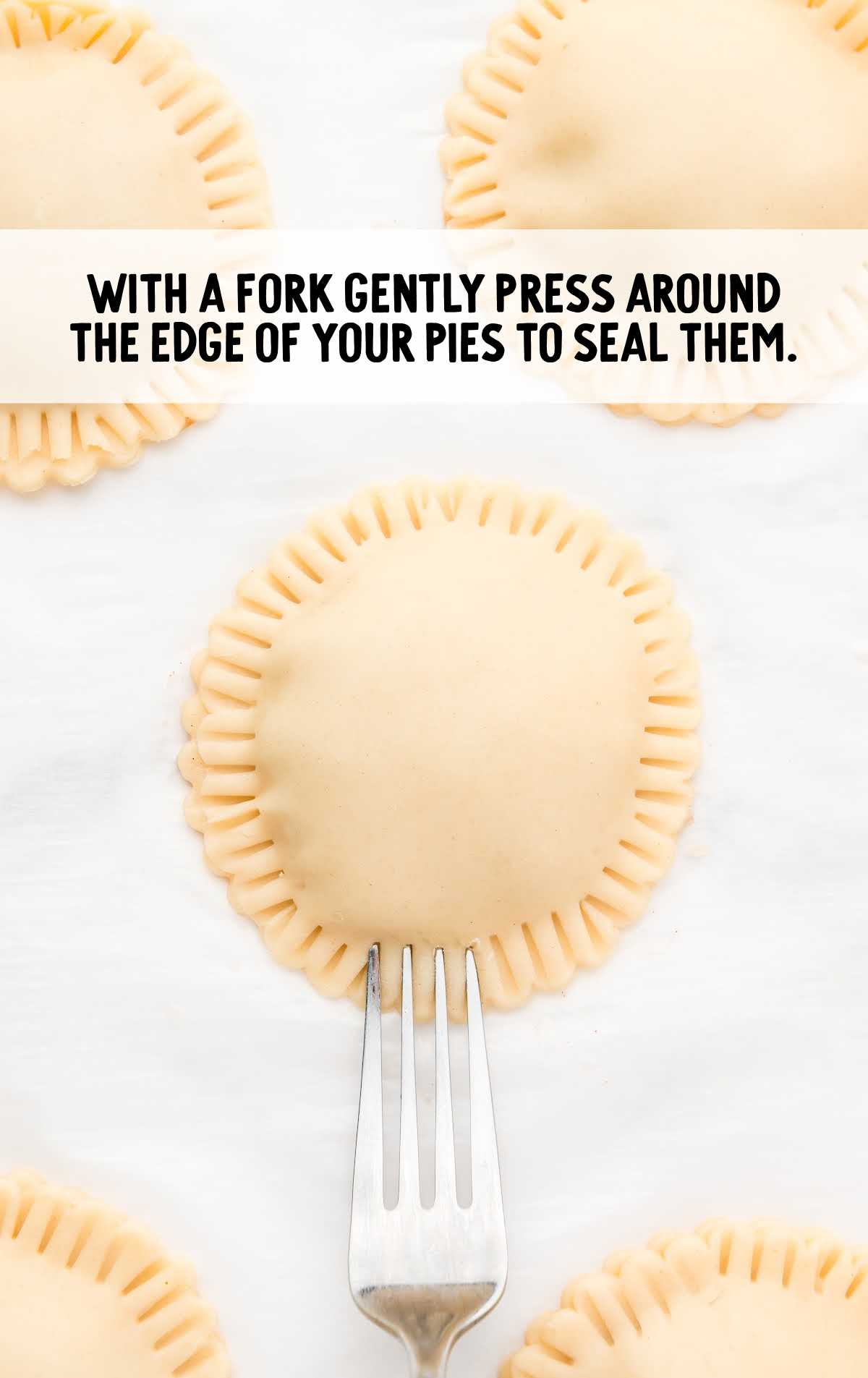 apple pie dough sealed with a fork