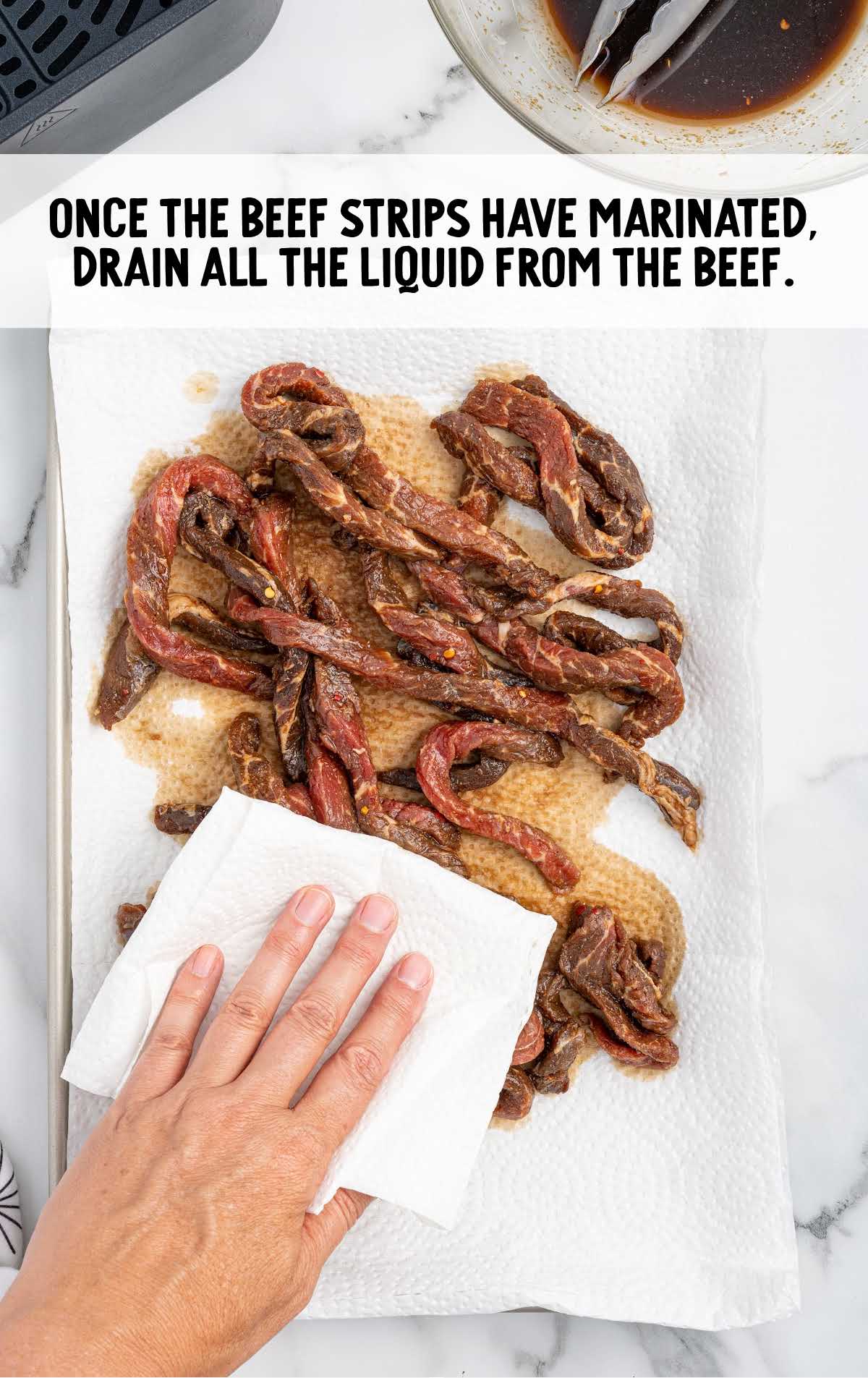drain liquid from the beef