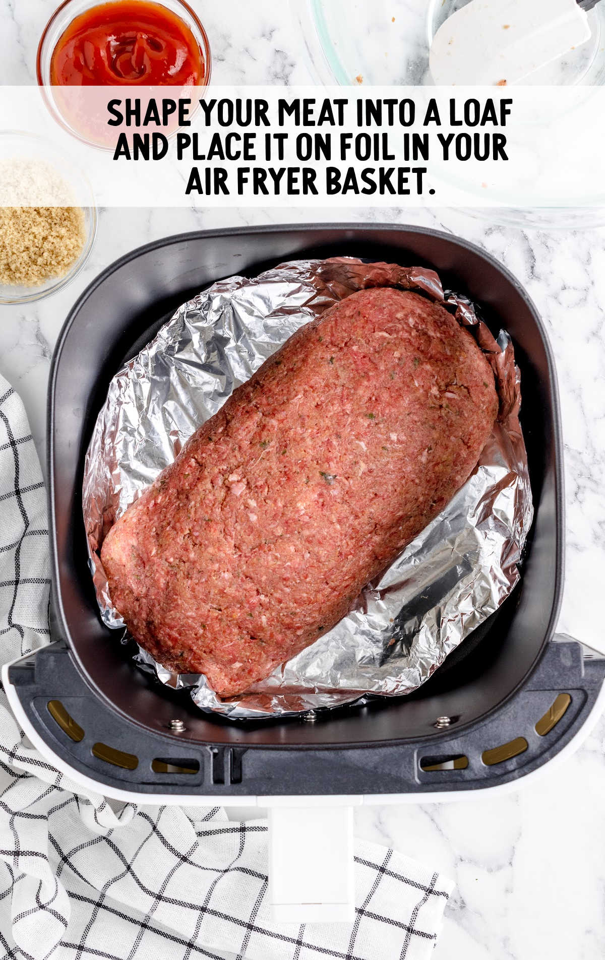 meatloaf placed into the air fryer basked