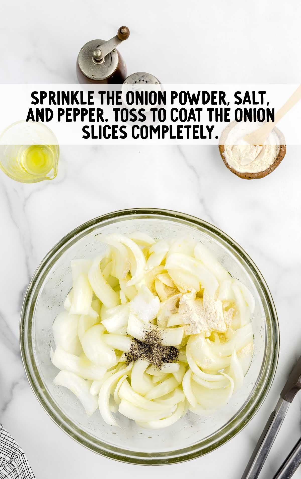 onion powder, salt, and pepper sprinkled over the onions