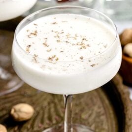 close up shot of a glass of Alexander Cocktail sprinkled with nutmeg