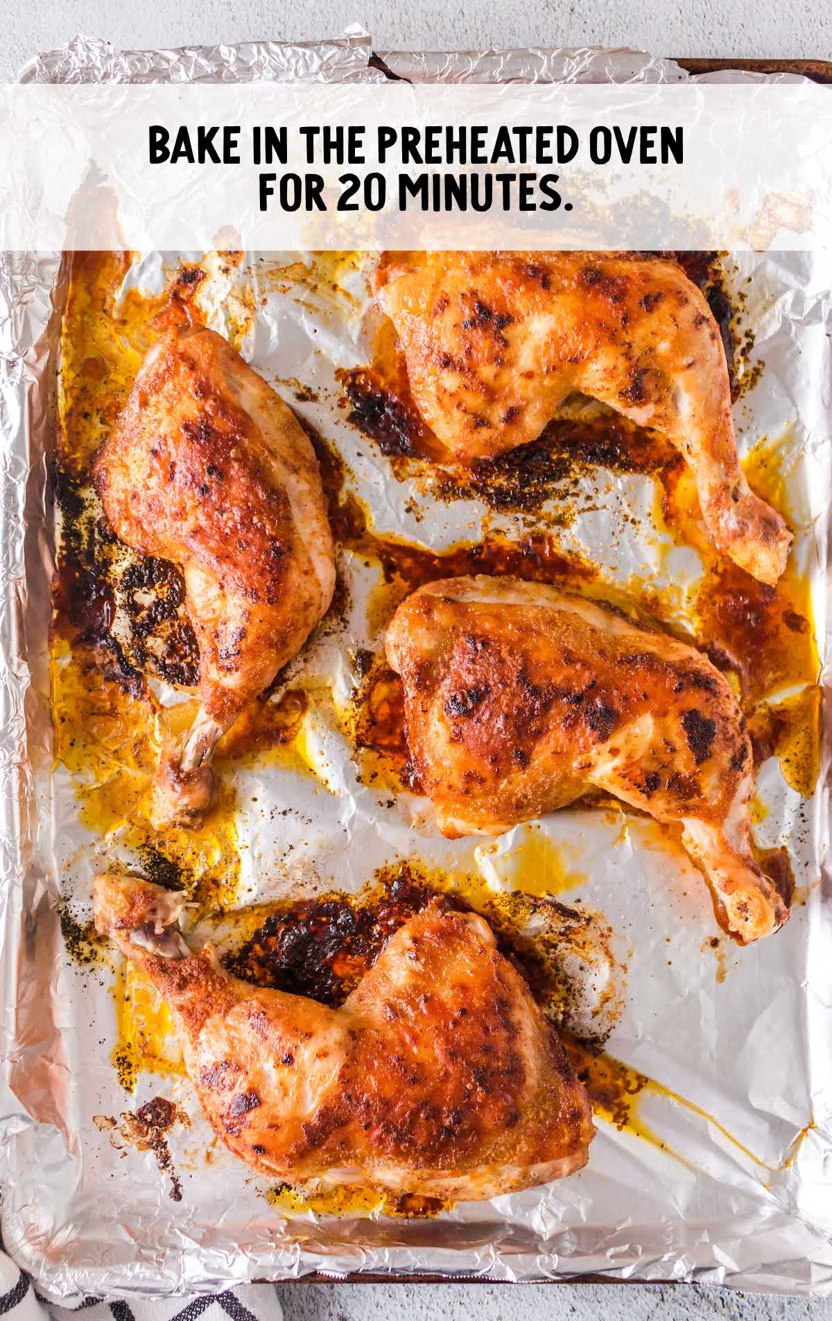 Baked Chicken Legs baked on a aluminum foil lined pan