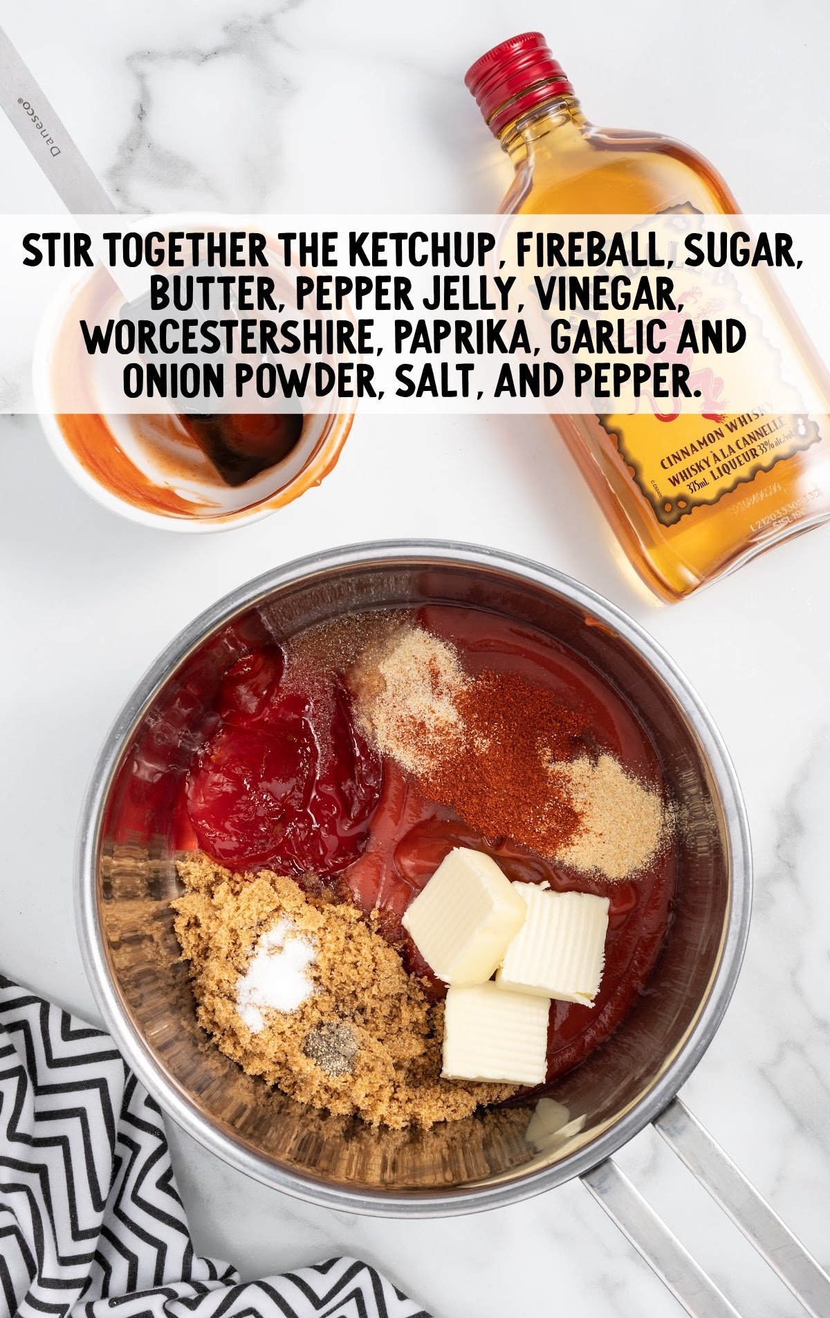 ketchup, fireball, sugar, butter, pepper jelly, vinegar, worcestershire, paprika, garlic and onion powder, salt, and pepper stirred together