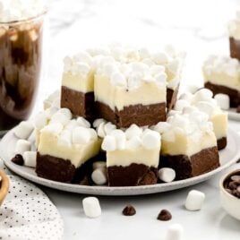 close up shot of Hot Chocolate Fudge stacked on top of each other on a plate
