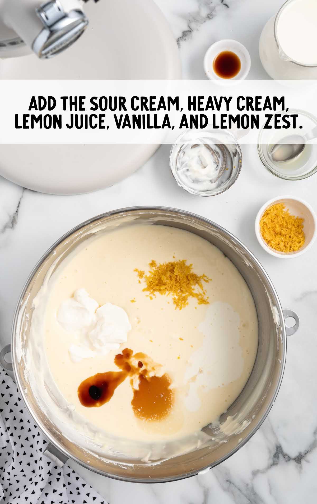 sour cream, heavy cream, lemon juice, vanilla,. and lemon zest added