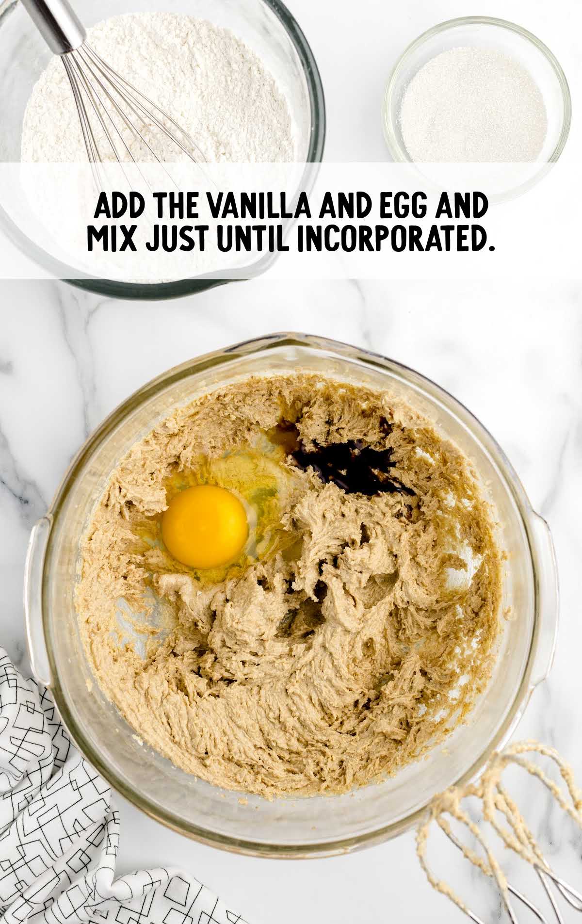 vanilla and egg combined with the bowl of ingredients