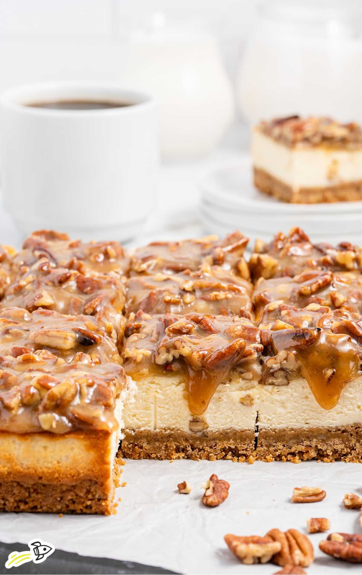 a close up shot of slices of Pecan Pie Cheesecake Bar