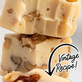Three pieces of Maple Walnut Fudge are stacked, each with visible chunks of walnut. Text reads, The Best Maple Walnut Fudge, Vintage Recipe! in bold, decorative lettering.