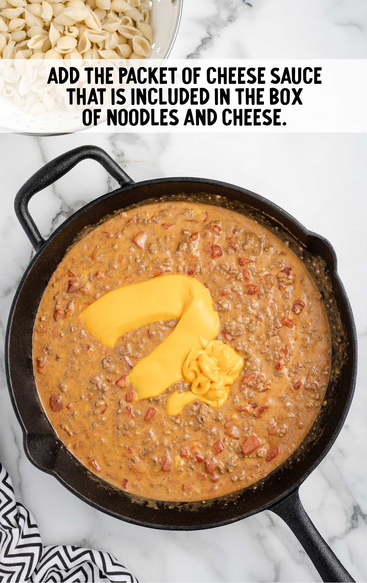 packet of cheese sauce added to the skillet