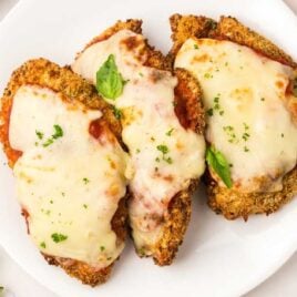 overhead shot of a couple of Air Fryer Chicken Parmesan on a plate