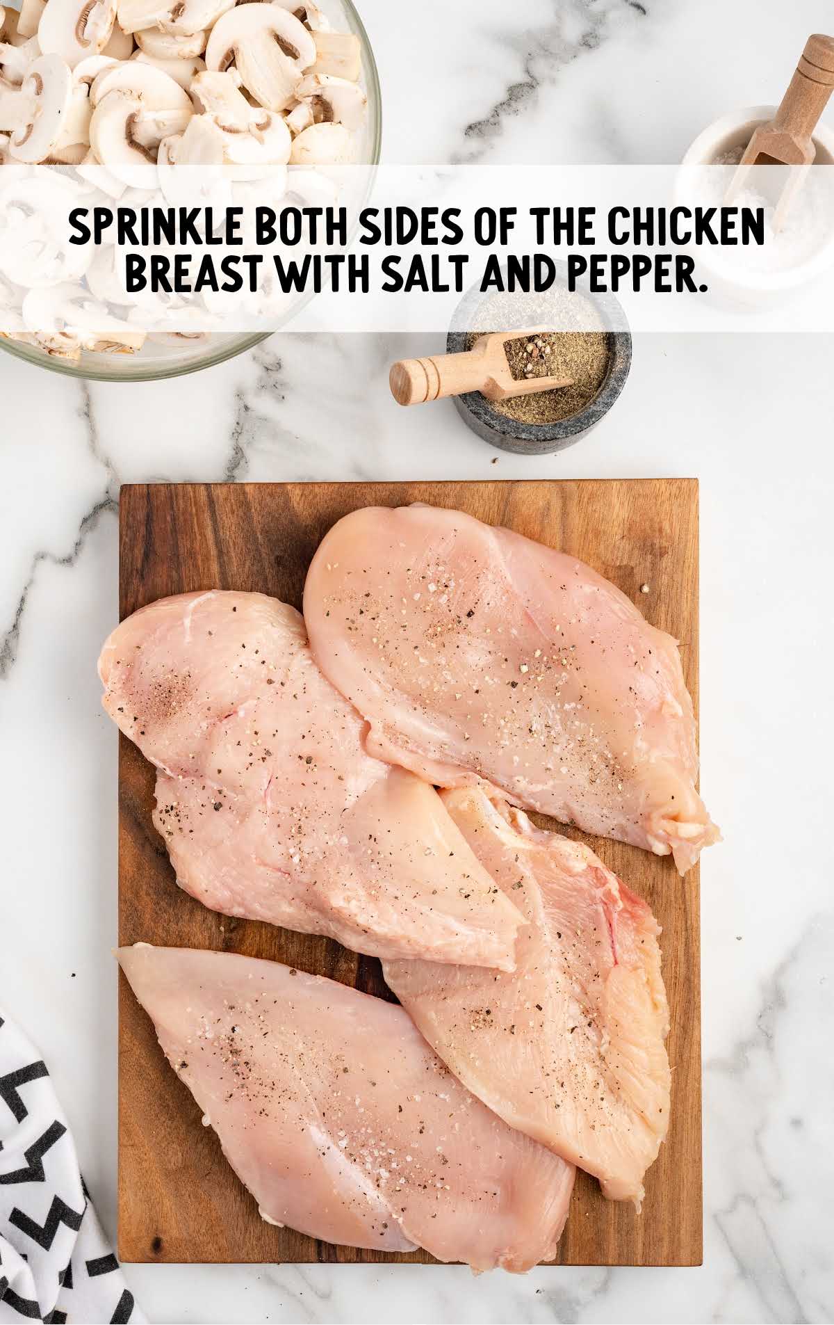 salt and pepper sprinkled over the chicken breast