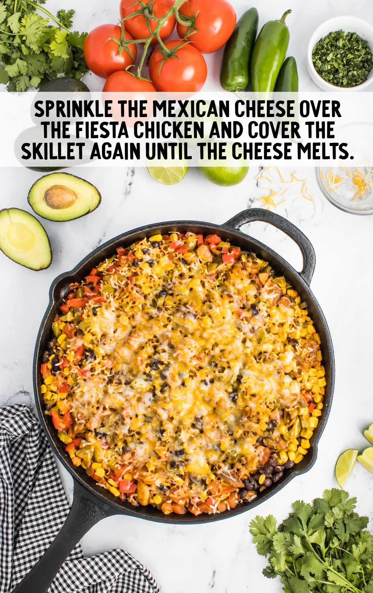 Mexican cheese sprinkled over the fiesta chicken