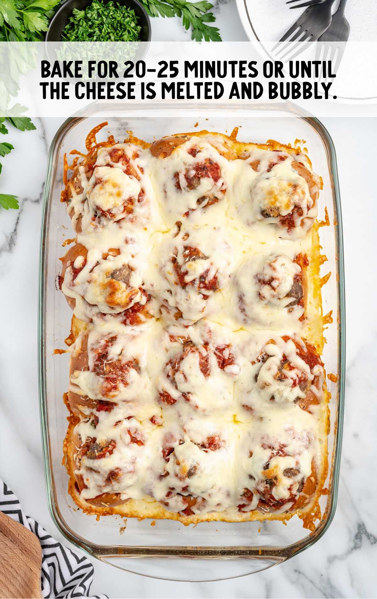 Garlic Bread Meatballs baked in a baking dish