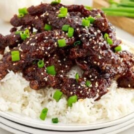 close up shot of Ginger Beef on a plate with rice