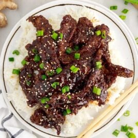 overhead shot of Ginger Beef on a plate with rice