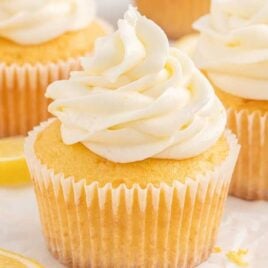 close up shot of cupcakes topped with Lemon Cream Cheese Frosting