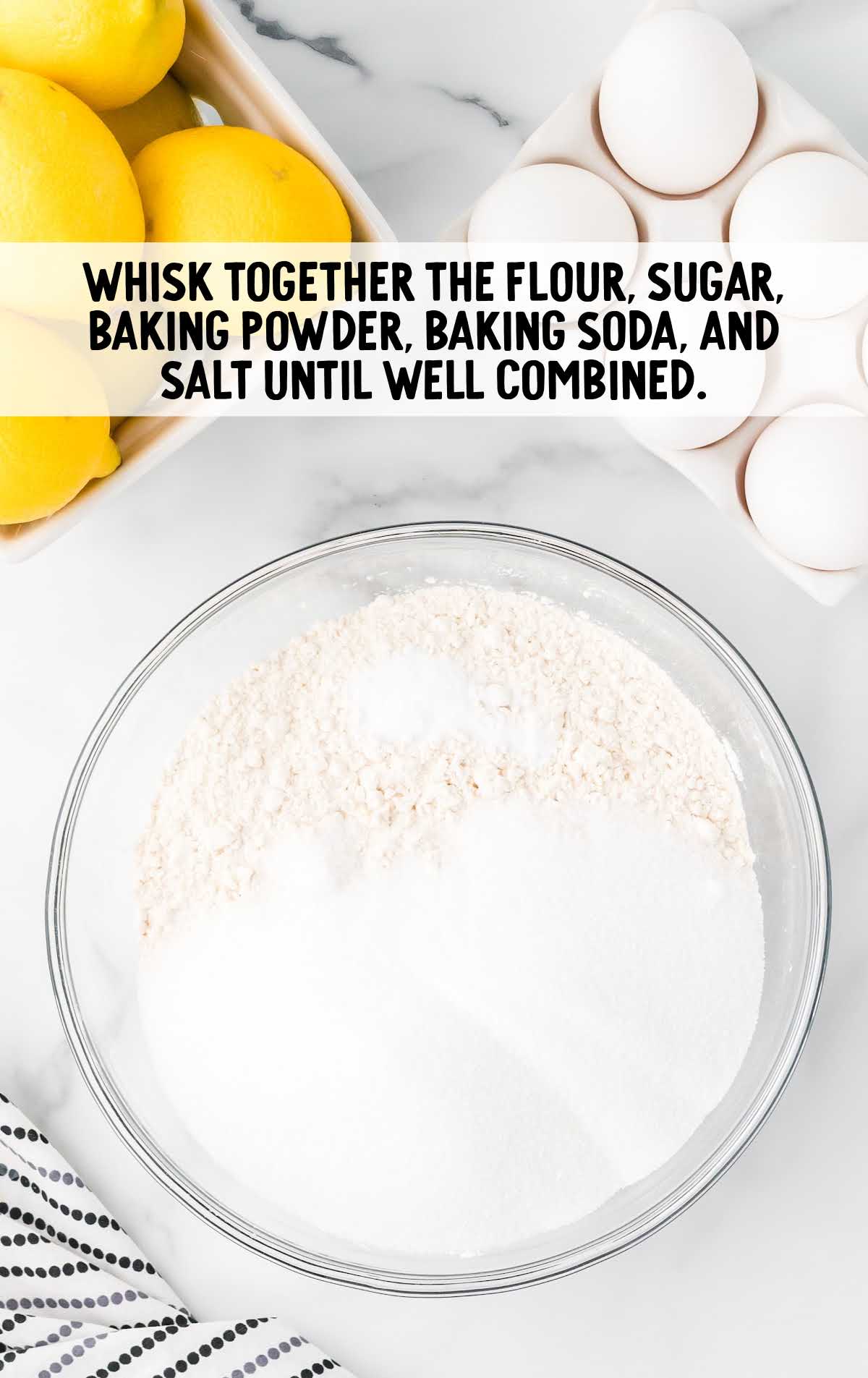 flour, sugar, baking powder, baking soda, and salt combined in a bowl