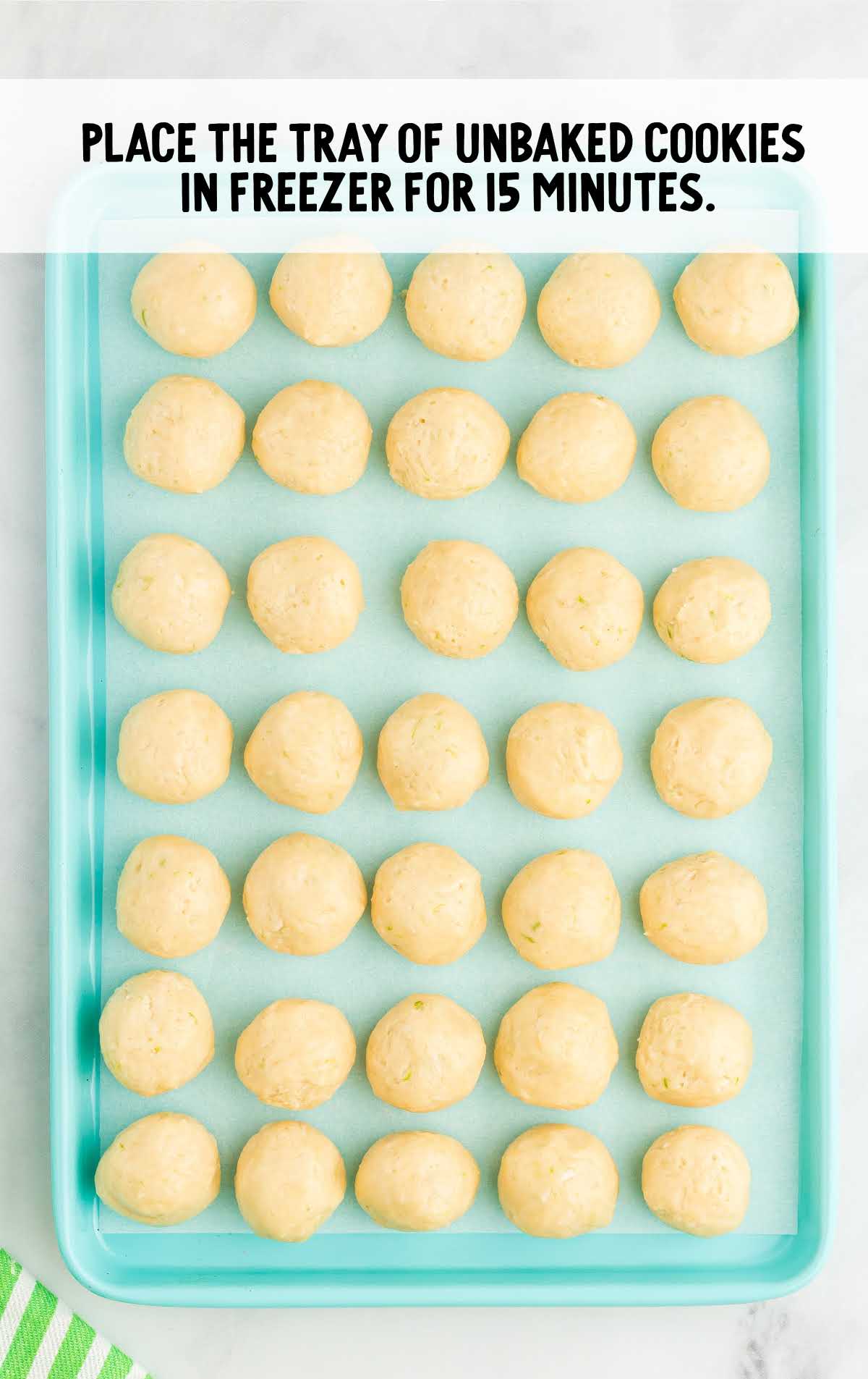 unbaked cookies placed on a baking sheet