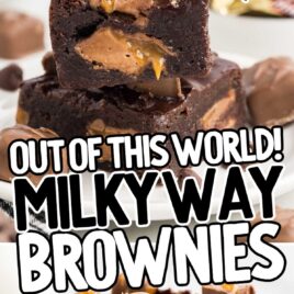 a close u shot of Milky Way Brownies stacked on top of each other with one having a bite taken out of it