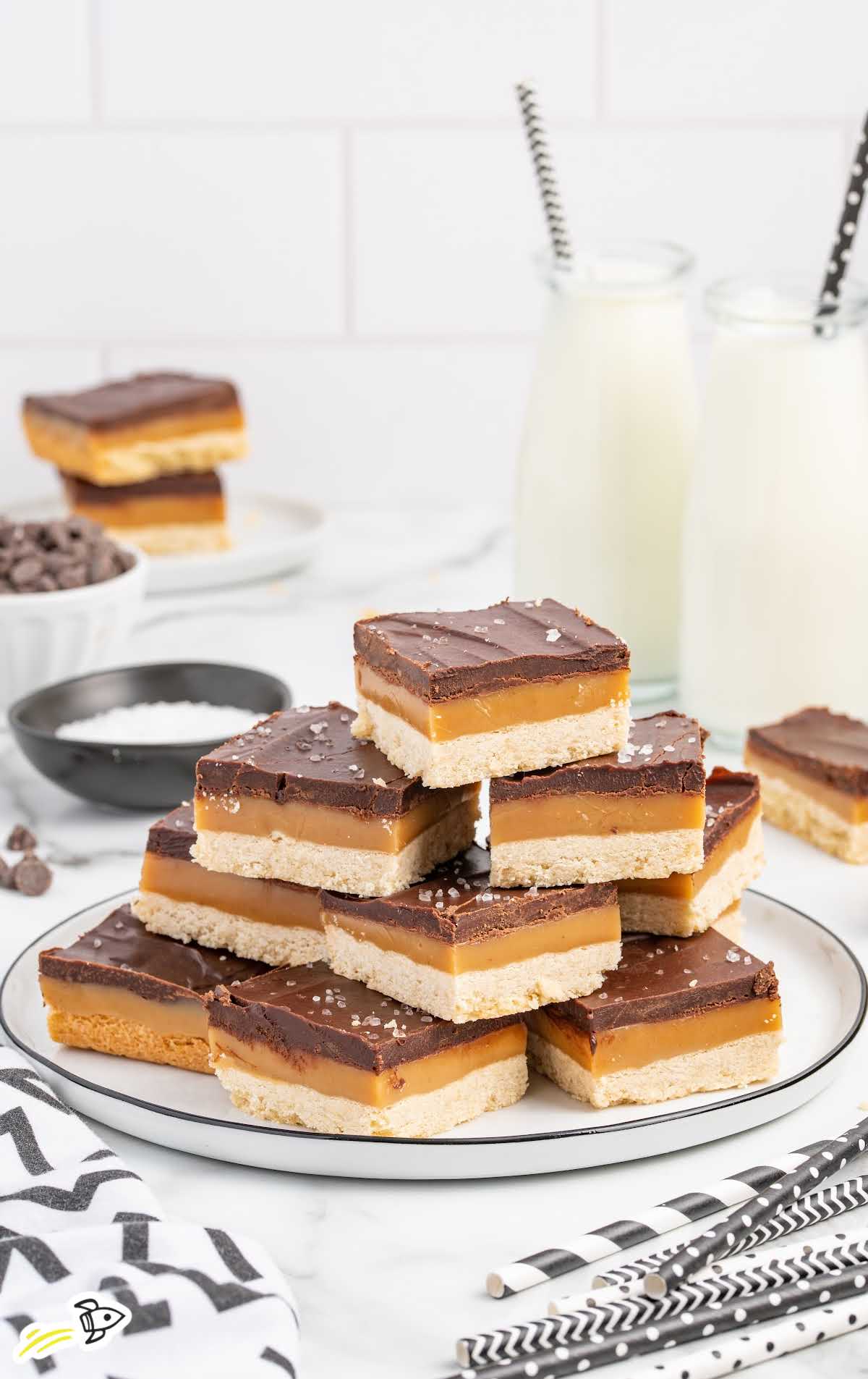 close up shot of Millionaire Shortbread stacked on top of each other on a plate