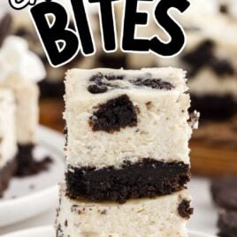 close up shot of Oreo Cheesecake Bites stacked on top of each other on a plate