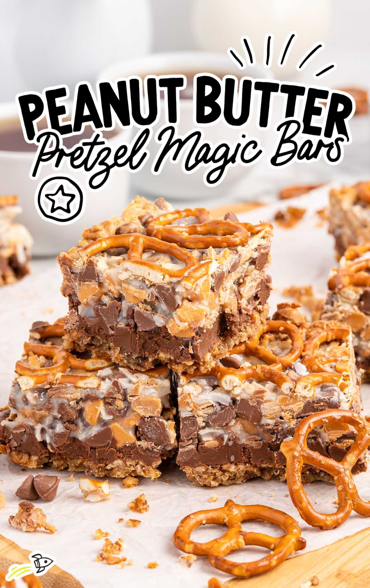 overhead shot of Peanut Butter Pretzel Magic Bars stacked on top of each other