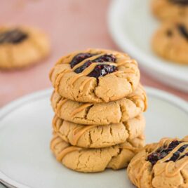 close up shot of cookies stacked on top of each other on a plate