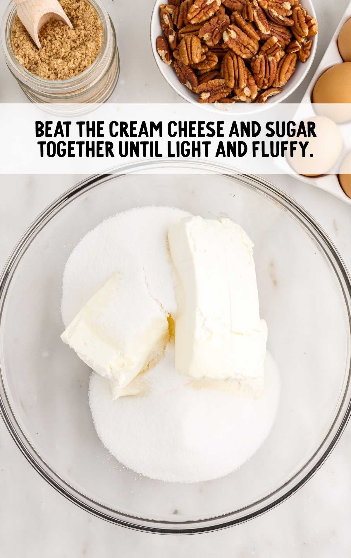 cream cheese and sugar combined in a bowl