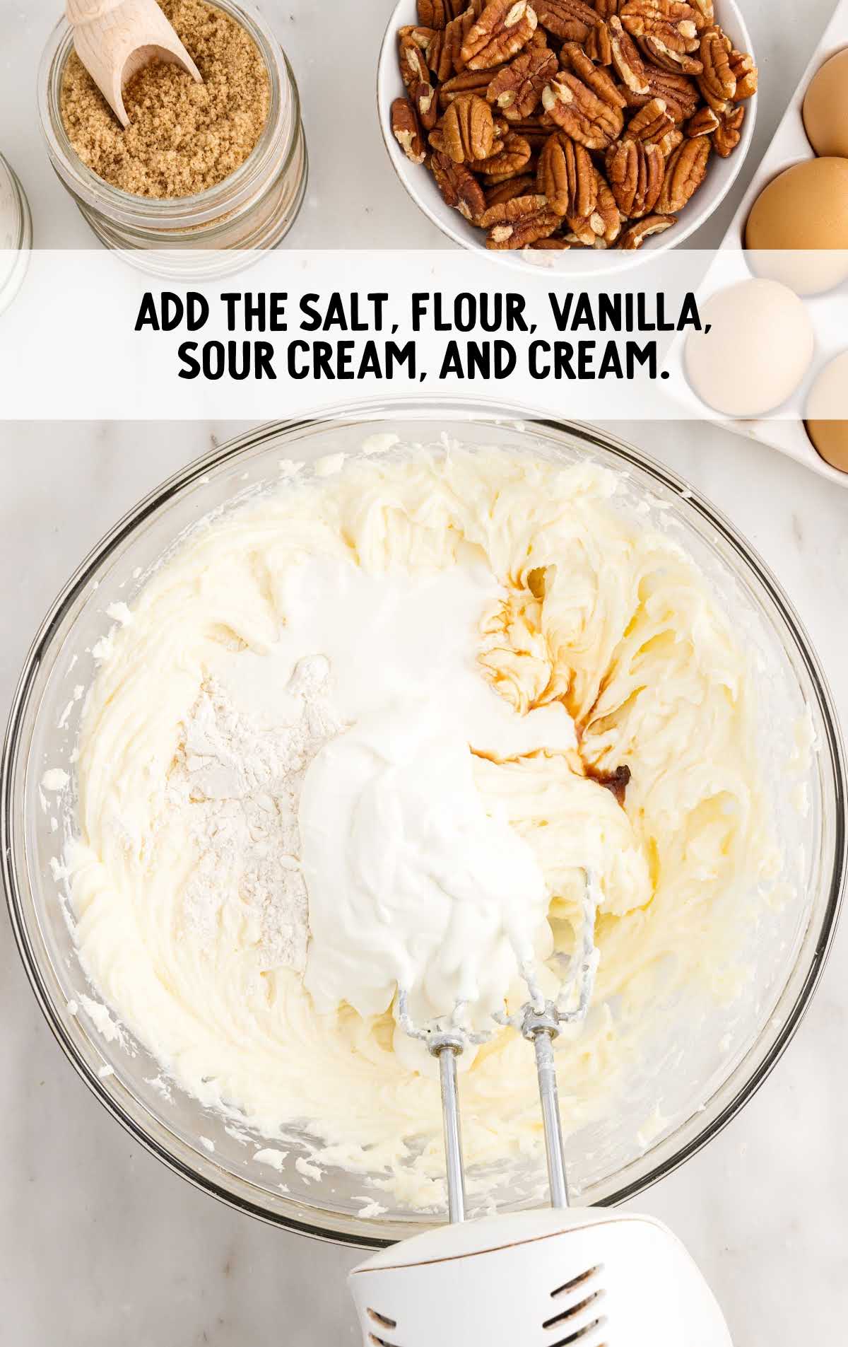 salt, flour, vanilla, sour cream, and heavy cream combined in a bowl