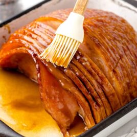 close up shot of glaze brushed on the ham