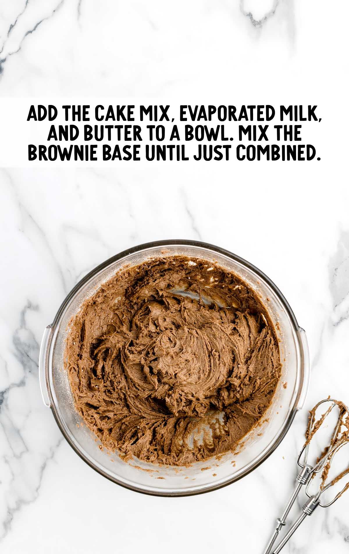 cake mix, evaporated milk, and butter added to a bowl