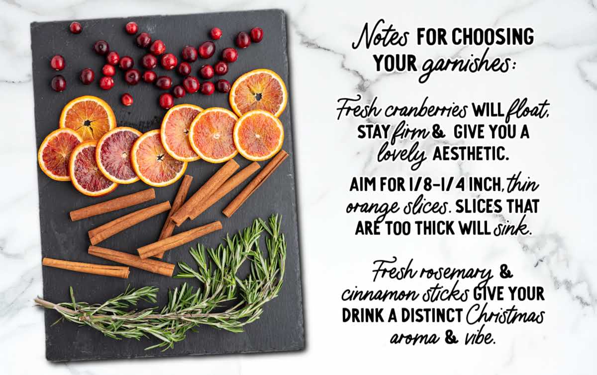 Garnish tips for cranberry Christmas cocktail with fresh cranberries, thin orange slices, cinnamon sticks, and rosemary sprigs displayed on a slate board with festive text overlay.