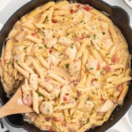 overhead shot of a pot of Cajun Chicken Pasta garnished with parsley